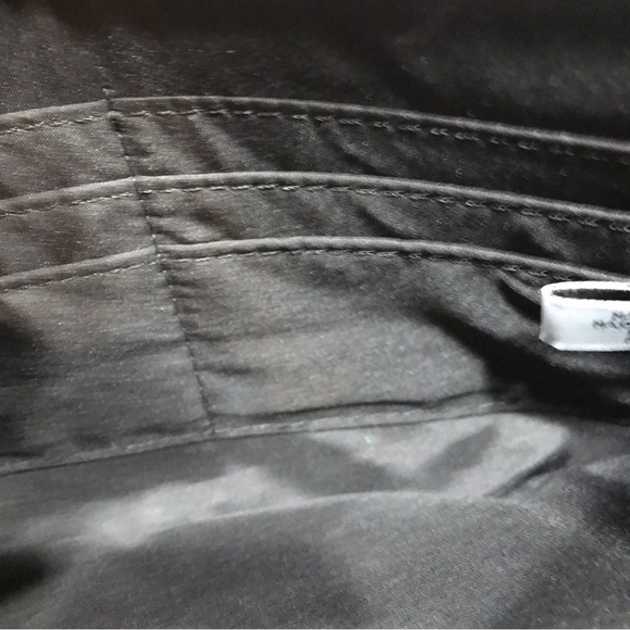 Nine West Black and White Cutout Flower Wristlet. - Picture 3 of 4